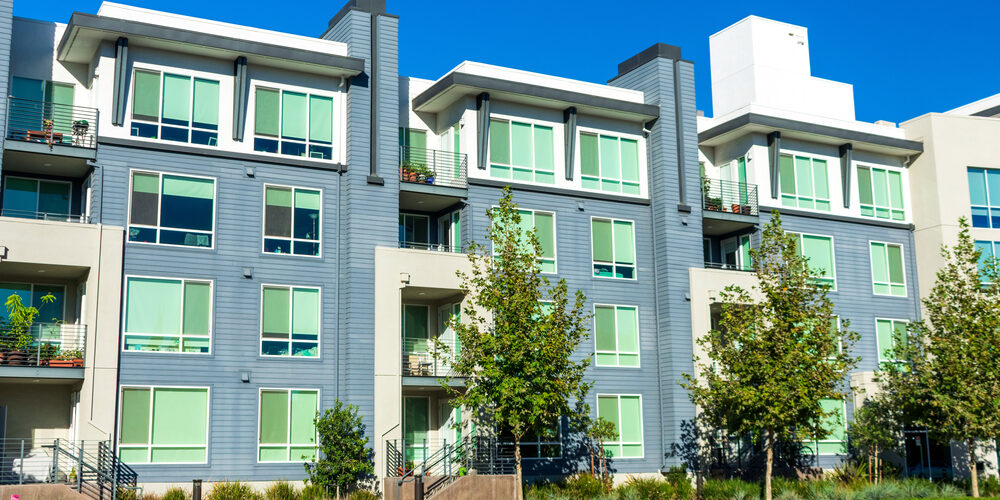 Exterior,Street,View,Of,Modern,Mid-rise,Four,Story,Apartment,Complex